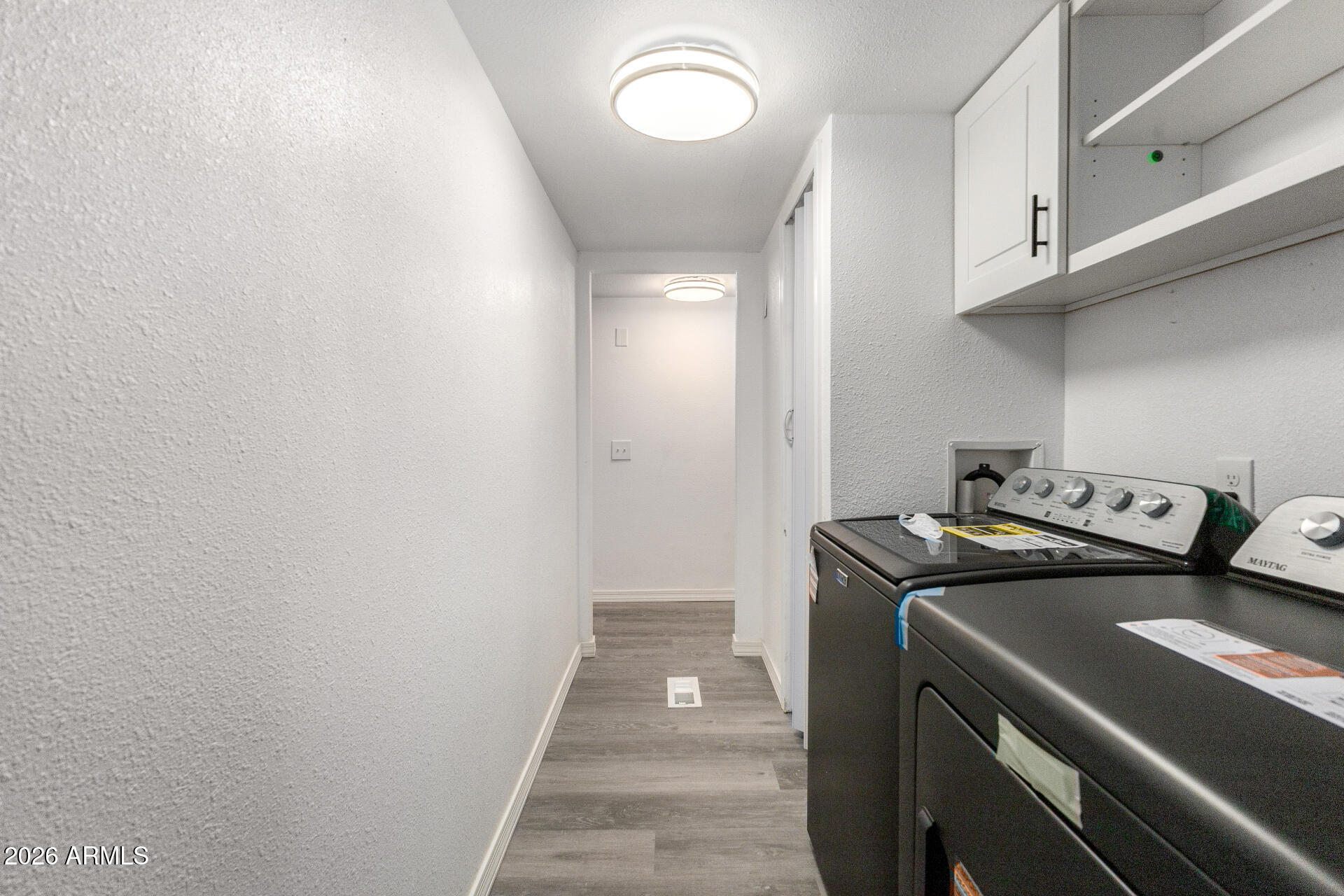 555 West Warner Road, Unit 125 Chandler, AZ 85225 - Photo 29 of 29 a utility room with dryer and washer