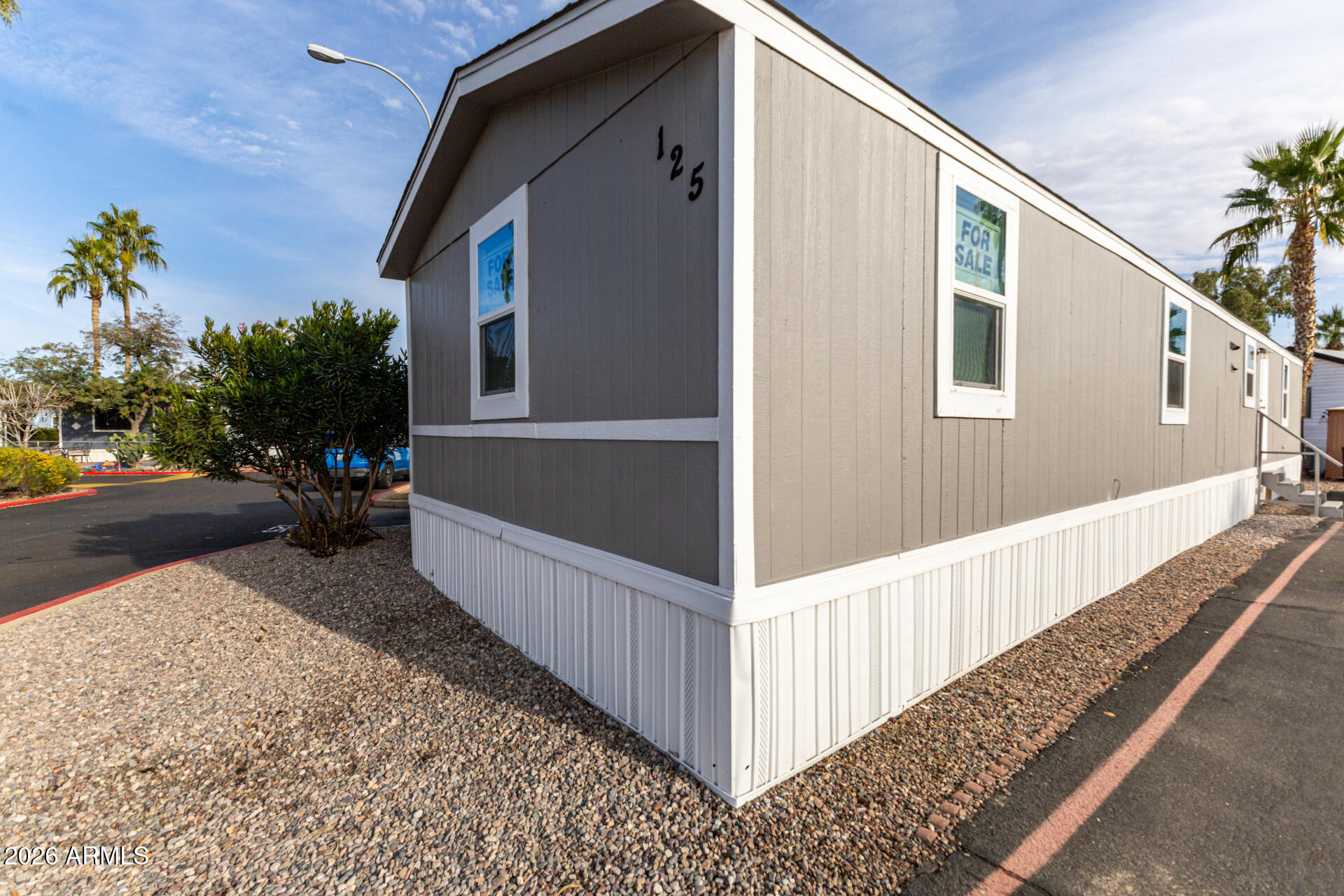 555 West Warner Road, Unit 125 Chandler, AZ 85225 - Photo 6 of 29 a view of a house with a yard