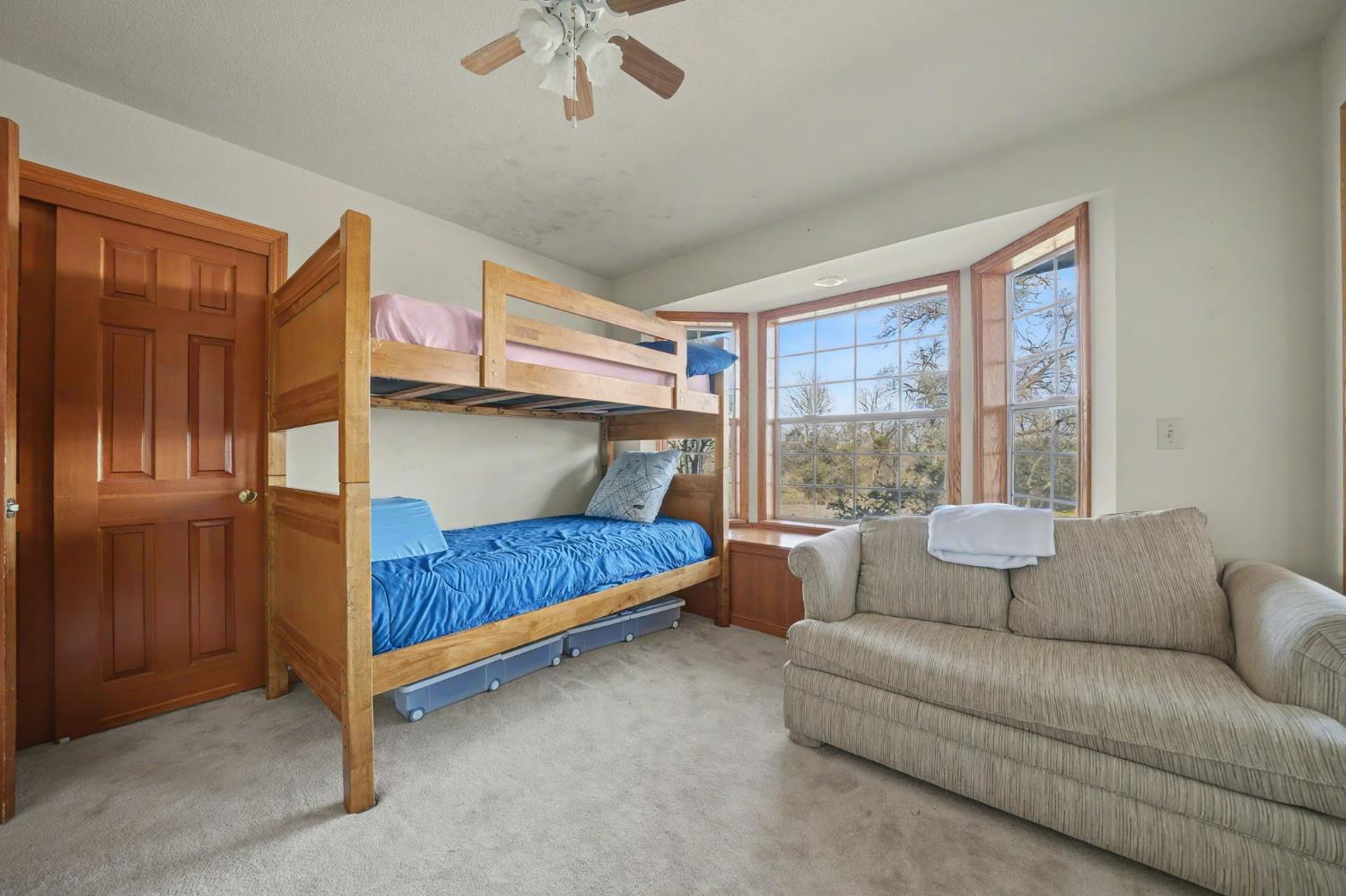 14899 Patton Road Plymouth, CA 95669 - Photo 19 of 52 Guest Bedroom With Built-In Desk And Storage Window Seat