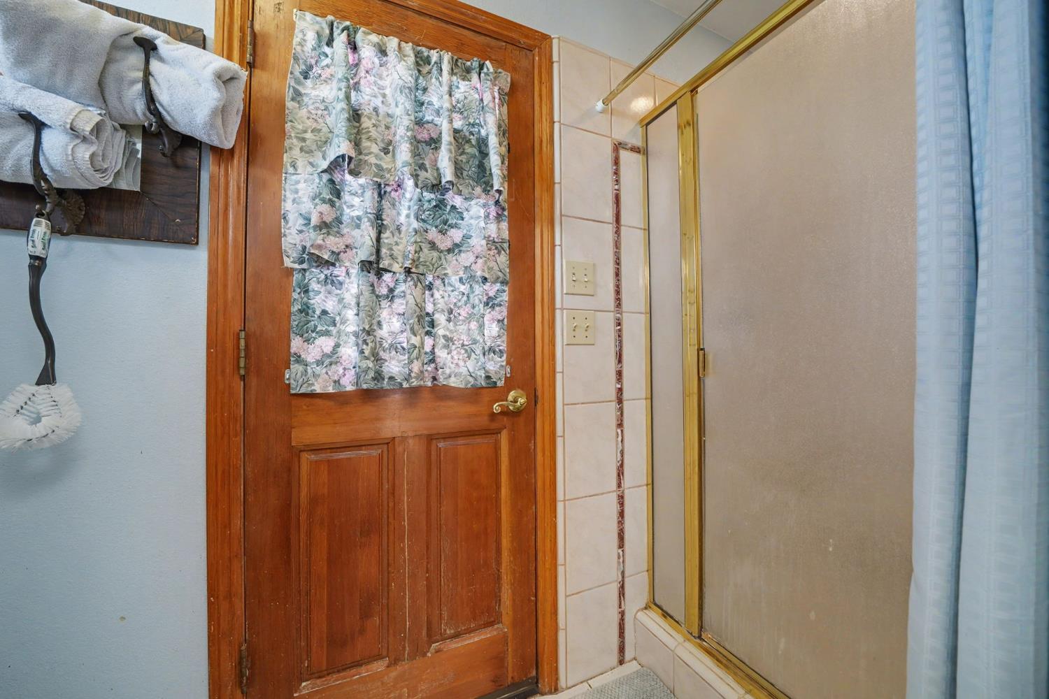 14899 Patton Road Plymouth, CA 95669 - Photo 30 of 52 Access Door to Backyard And Pool From The Primary Bath