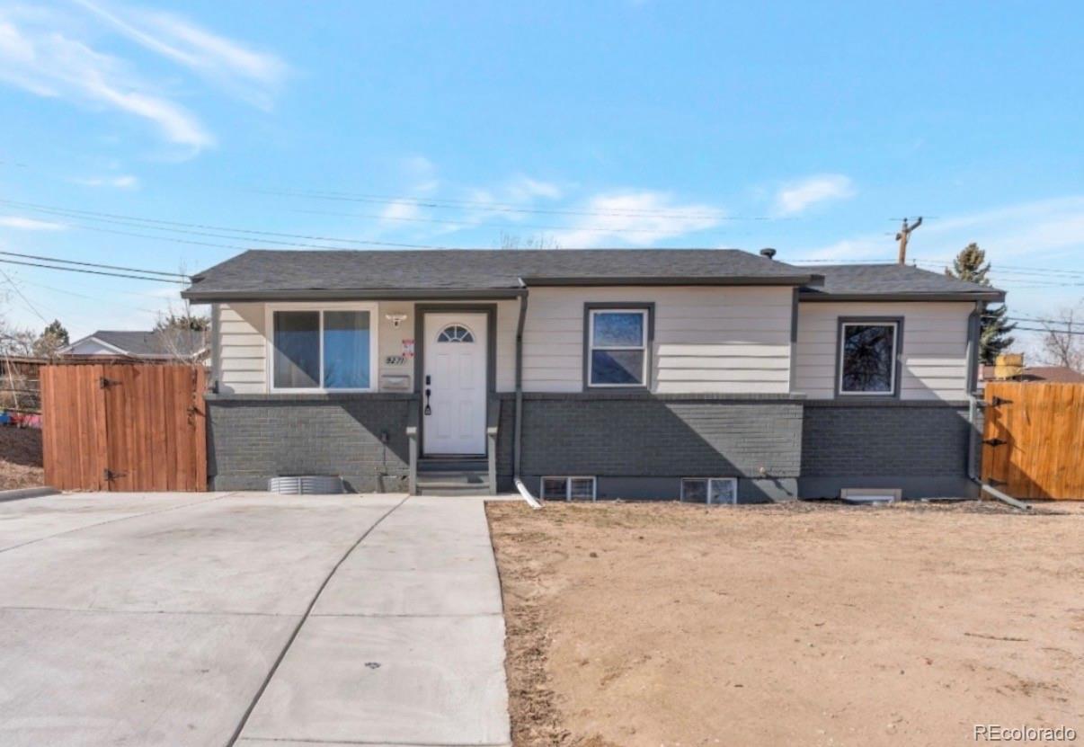 9271 Travis Street Thornton, CO 80229 - Photo 1 of 25 a view of house with outdoor space and sitting area