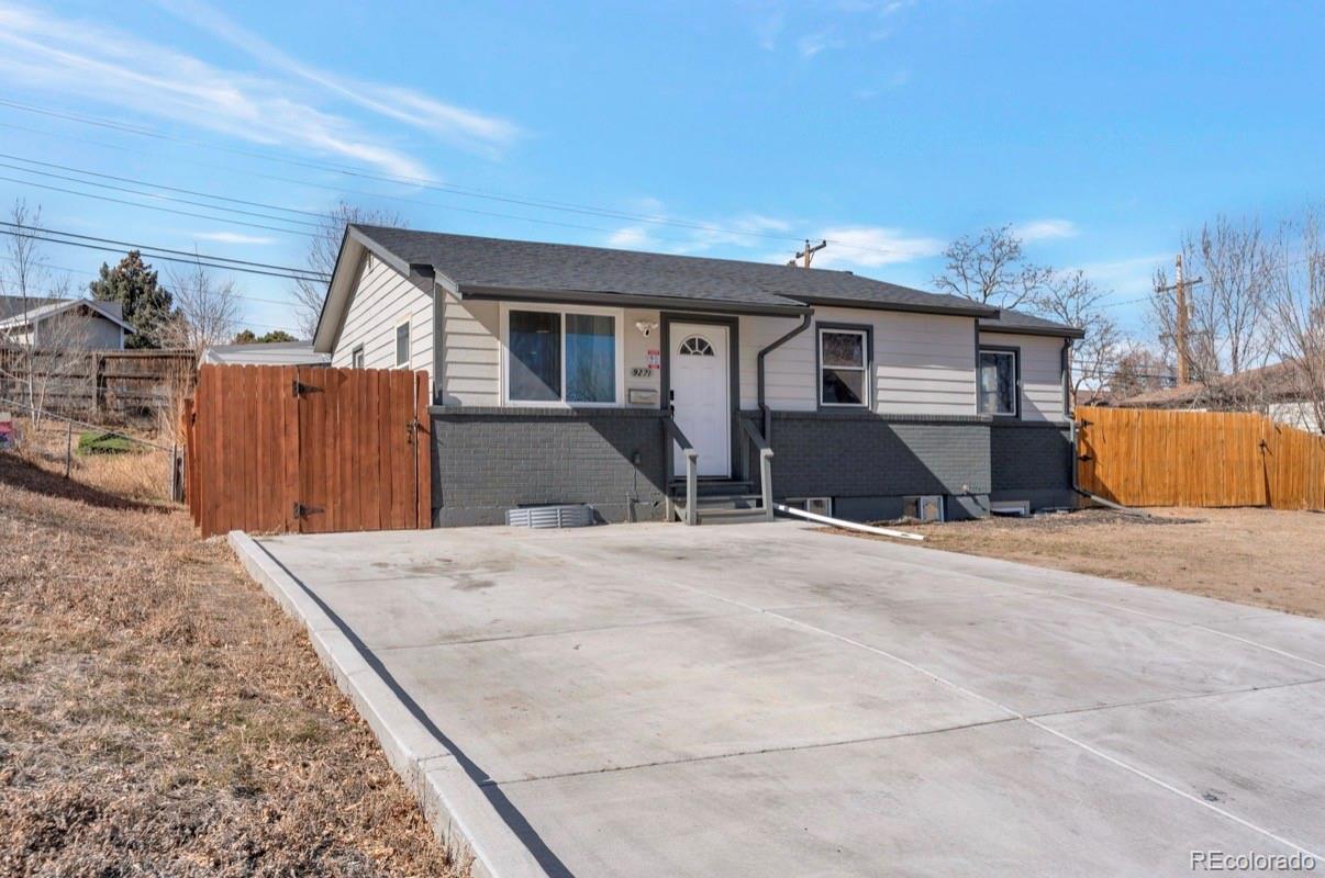 9271 Travis Street Thornton, CO 80229 - Photo 2 of 25 a view of a house