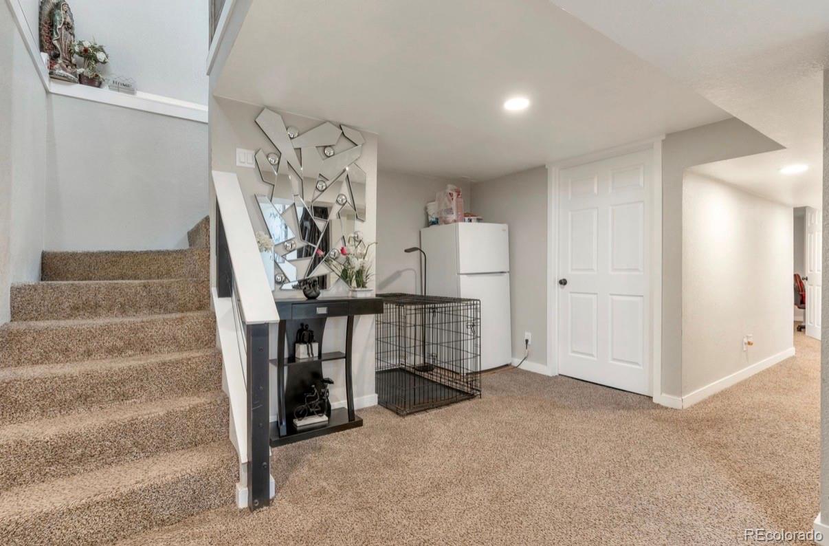 9271 Travis Street Thornton, CO 80229 - Photo 21 of 25 a view of an front door