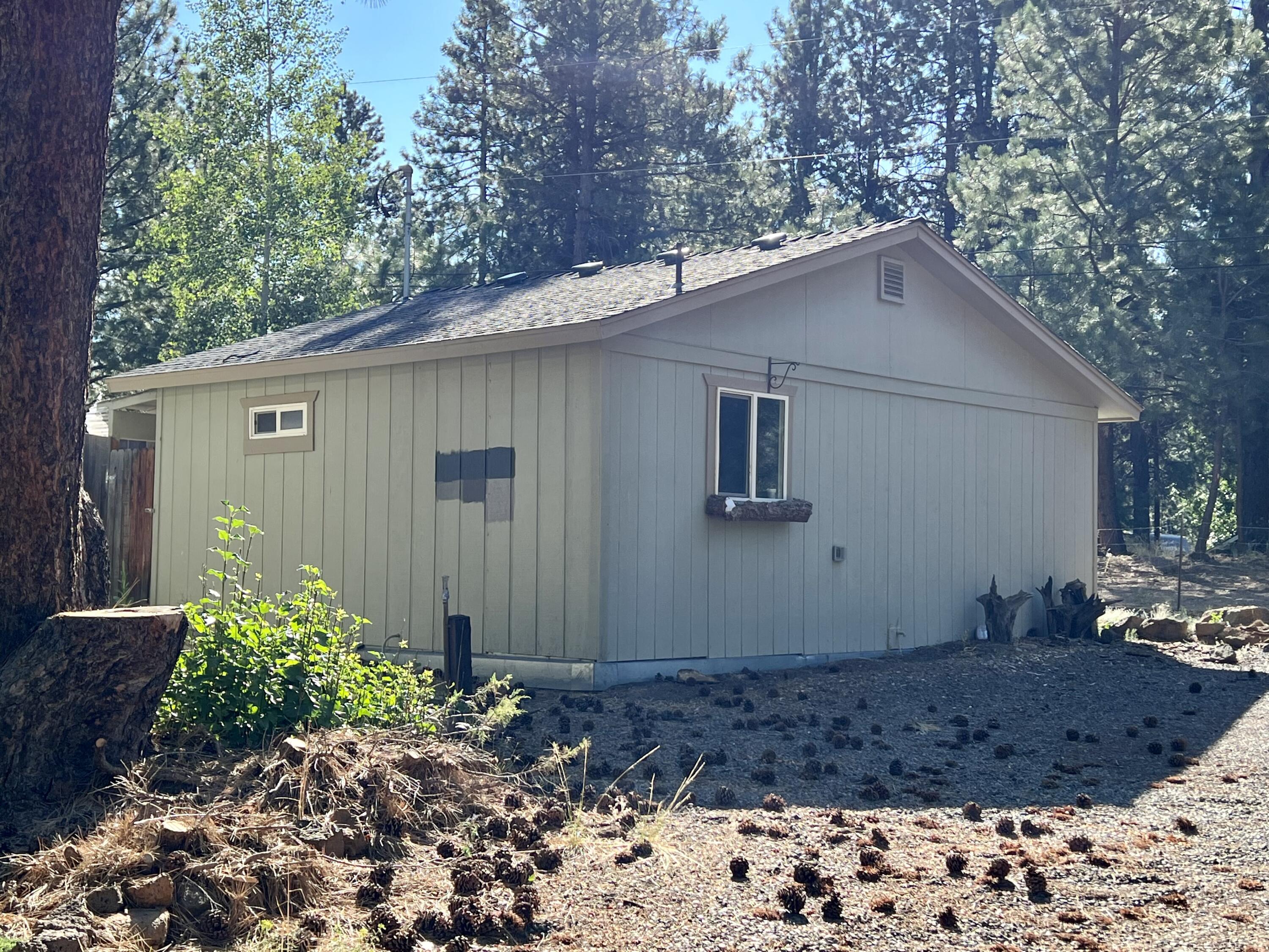 60492 Zuni Road Bend, OR 97702 - Photo 3 of 19 Cozy cottage in a beautiful treed setting.