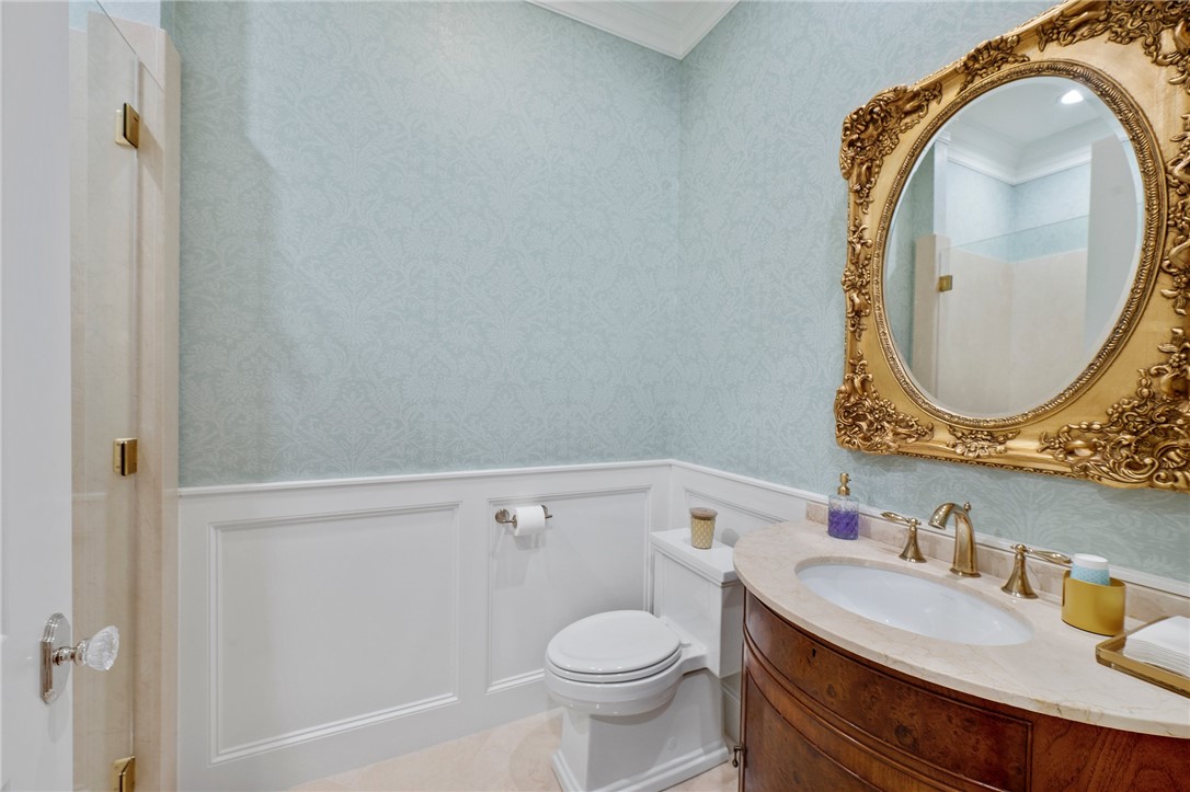 5108 Inverness Drive Bryan, TX 77802 - Photo 25 of 34 a bathroom with a sink and a mirror