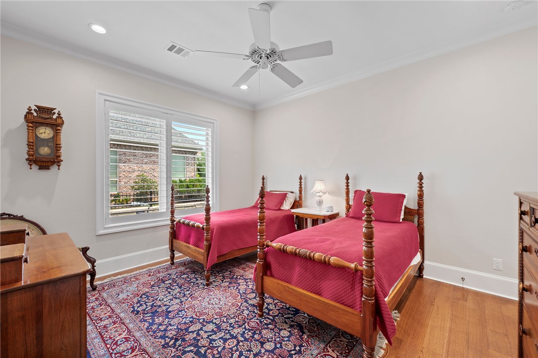 5108 Inverness Drive Bryan, TX 77802 - Photo 27 of 34 a bedroom with two beds and a window