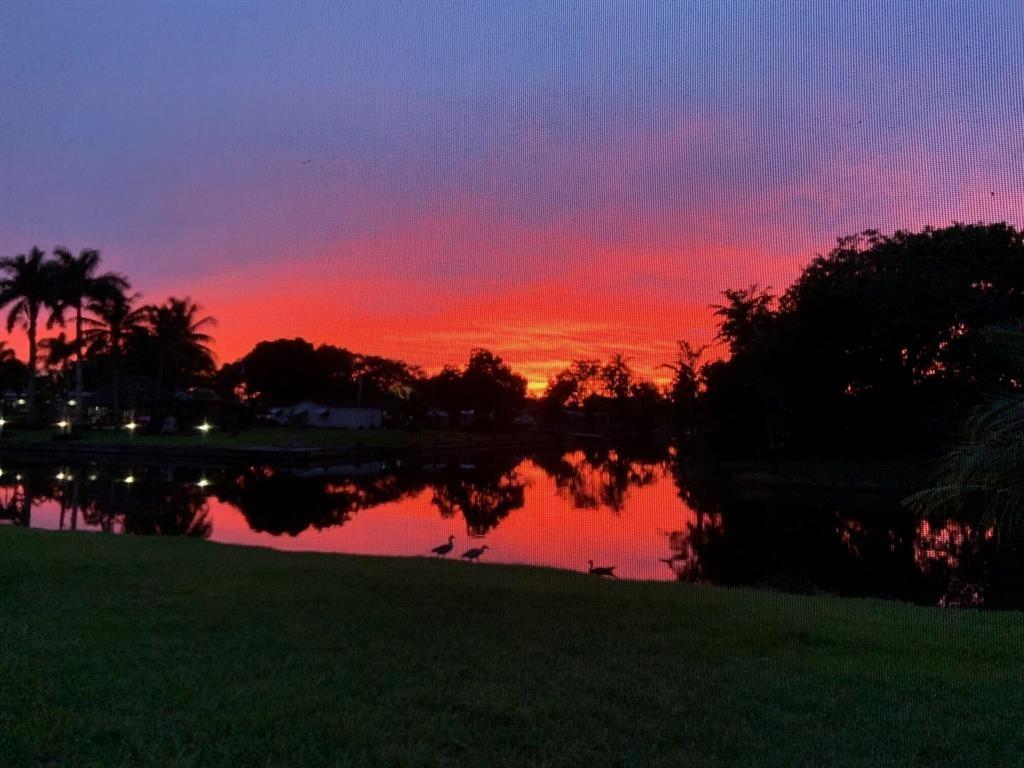 5241 Southwest 89th Avenue Cooper City, FL 33328 - Photo 28 of 28 a view of a lake in the background