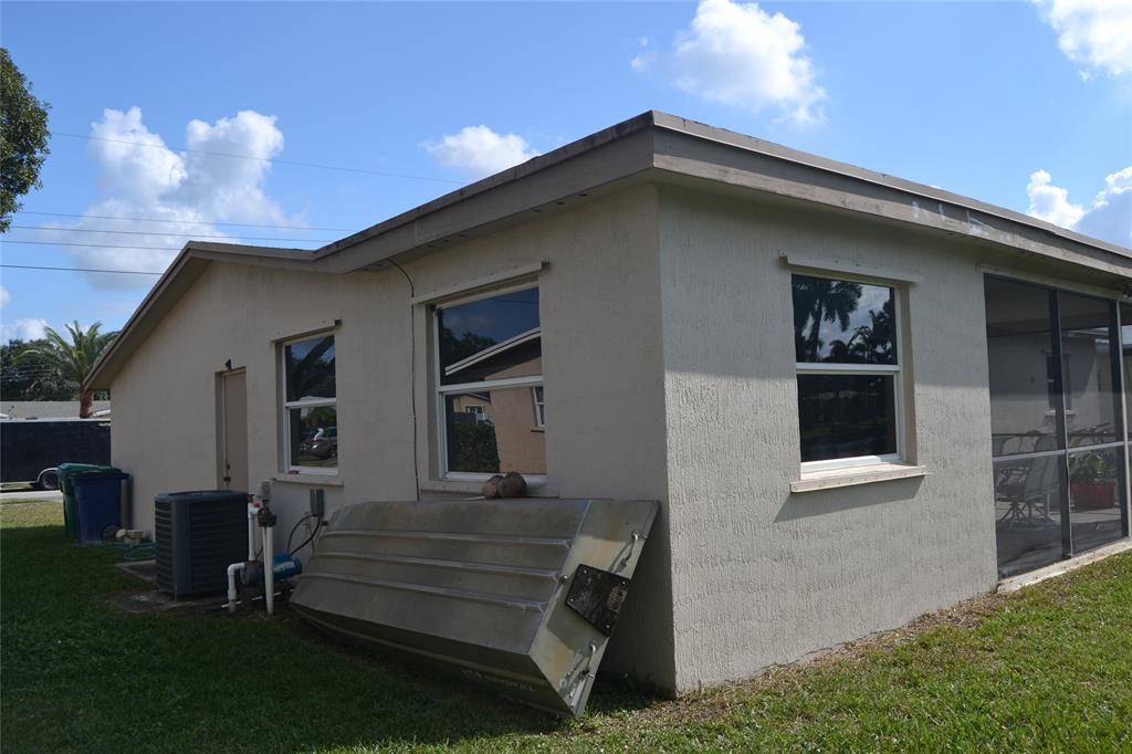 5241 Southwest 89th Avenue Cooper City, FL 33328 - Photo 6 of 28 a front view of a house with garden