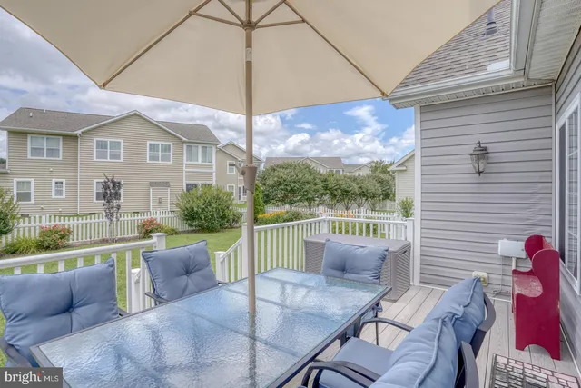 a bathroom with a shower sink and mirror