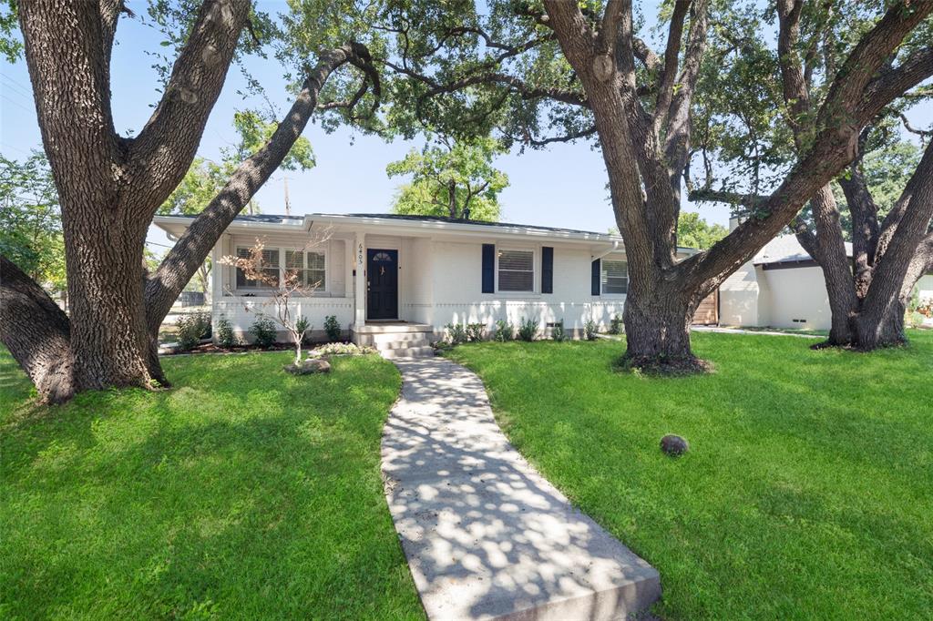 6405 Highgate Lane Dallas, TX 75214 - Photo 1 of 1 a front view of house with a garden
