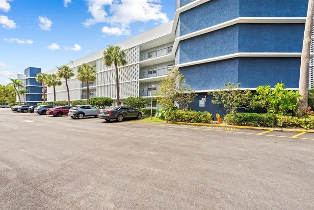 a cars parked in front of a building
