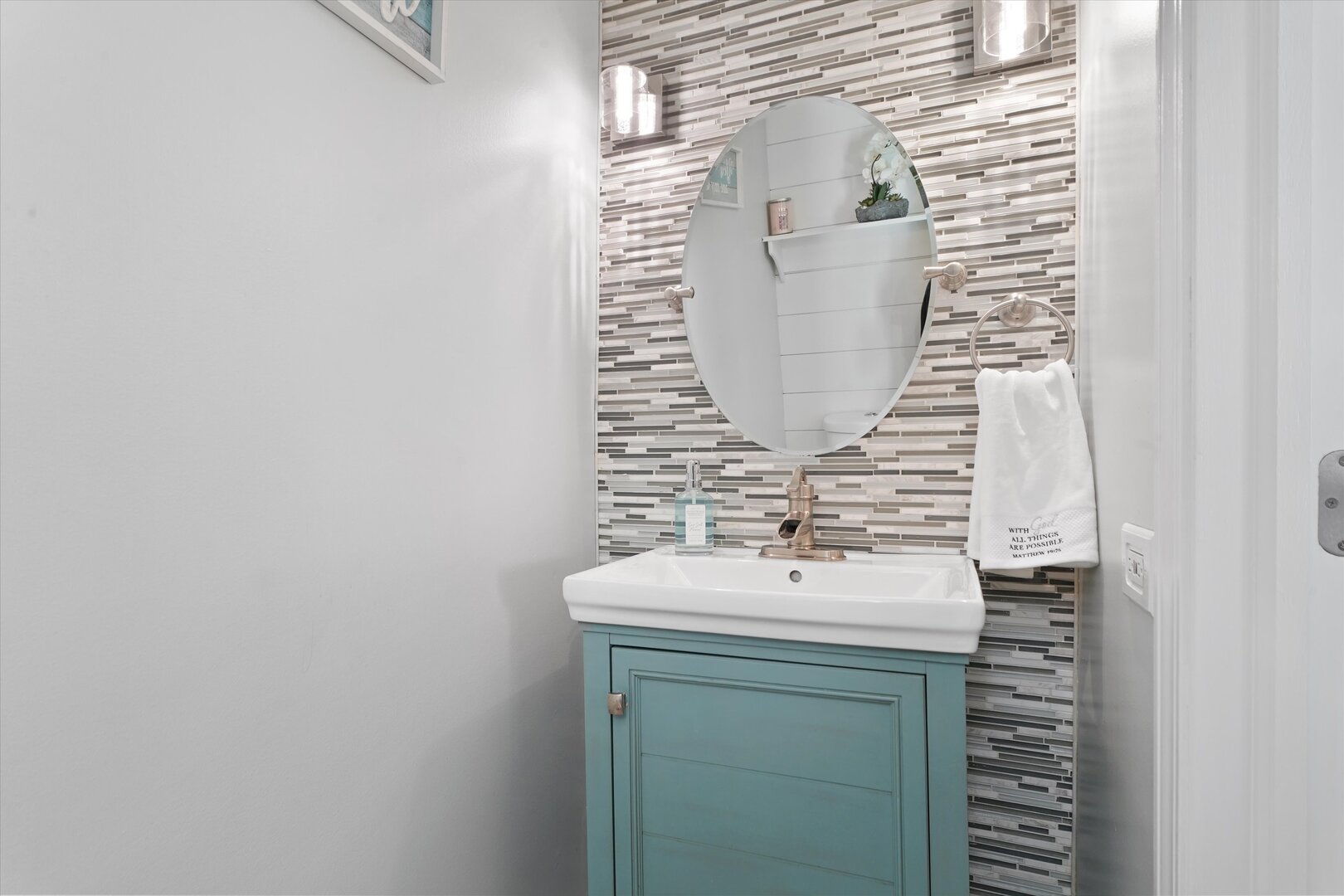 1334 Normantown Road Naperville, IL 60564 - Photo 8 of 19 a bathroom with a sink and a mirror