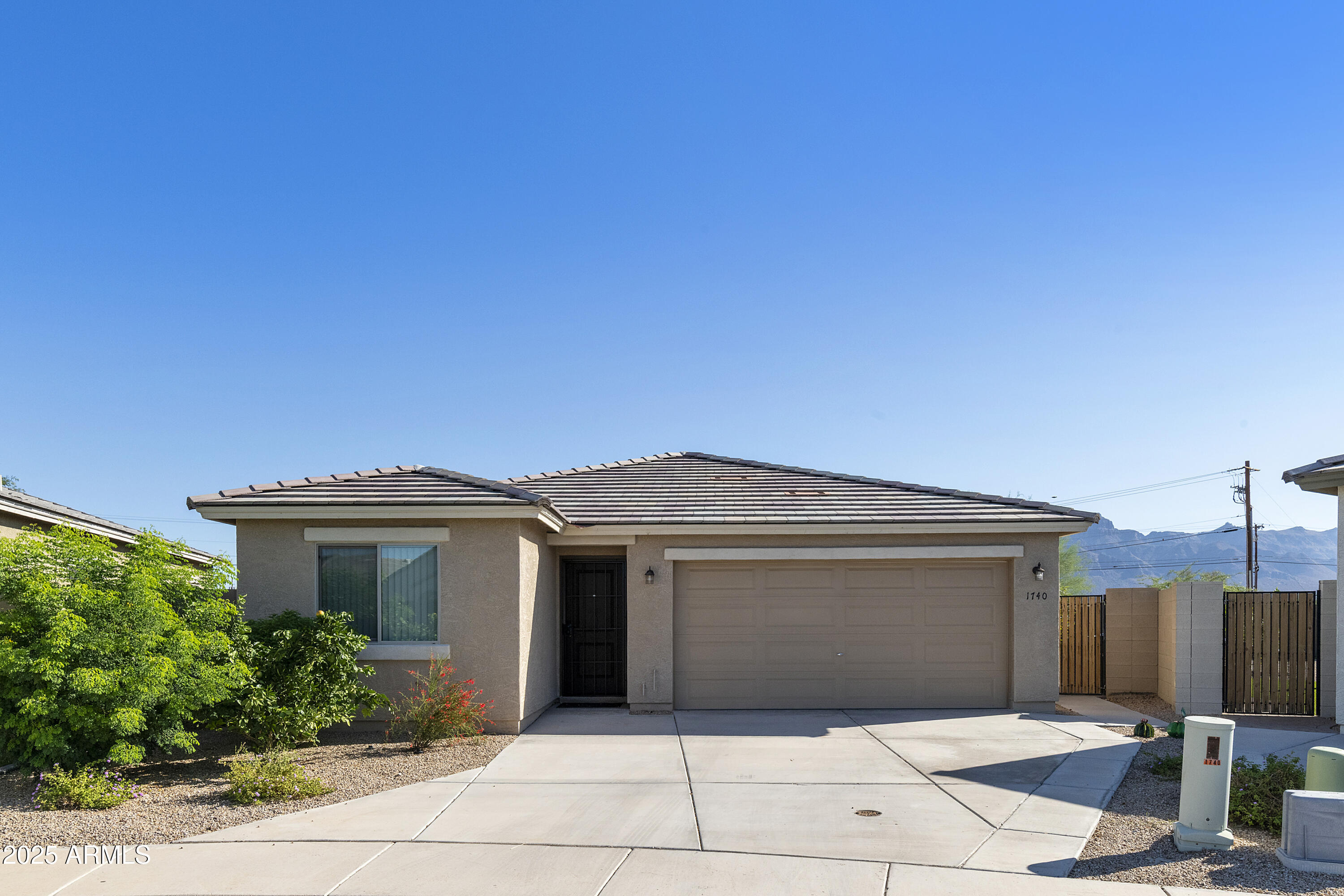 a front view of a house with a garage
