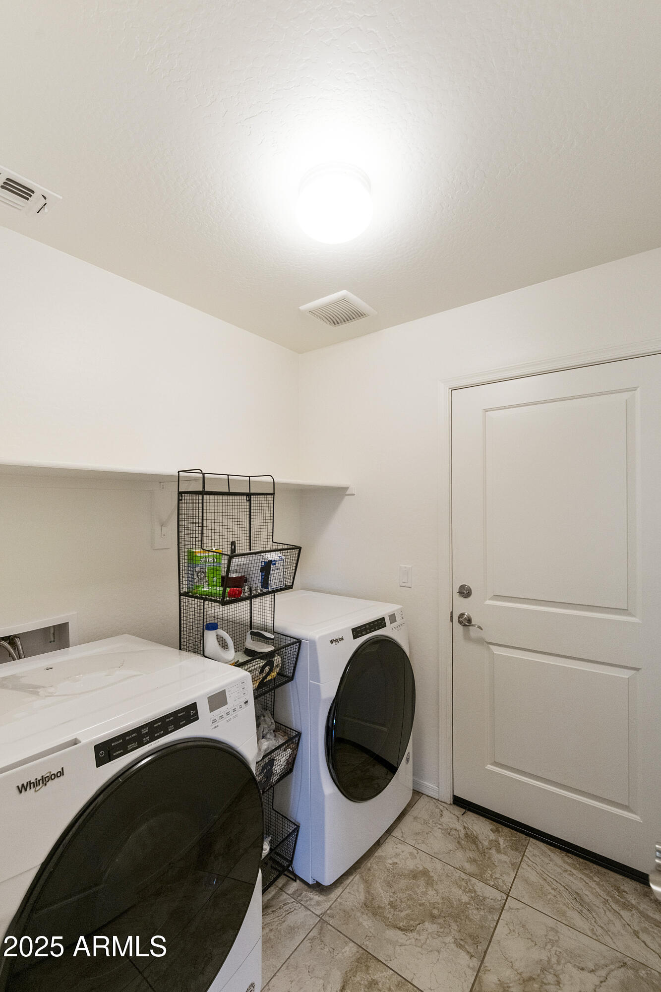 1740 East 16th Avenue Apache Junction, AZ 85119 - Photo 13 of 27 a utility room with sink dryer and washer
