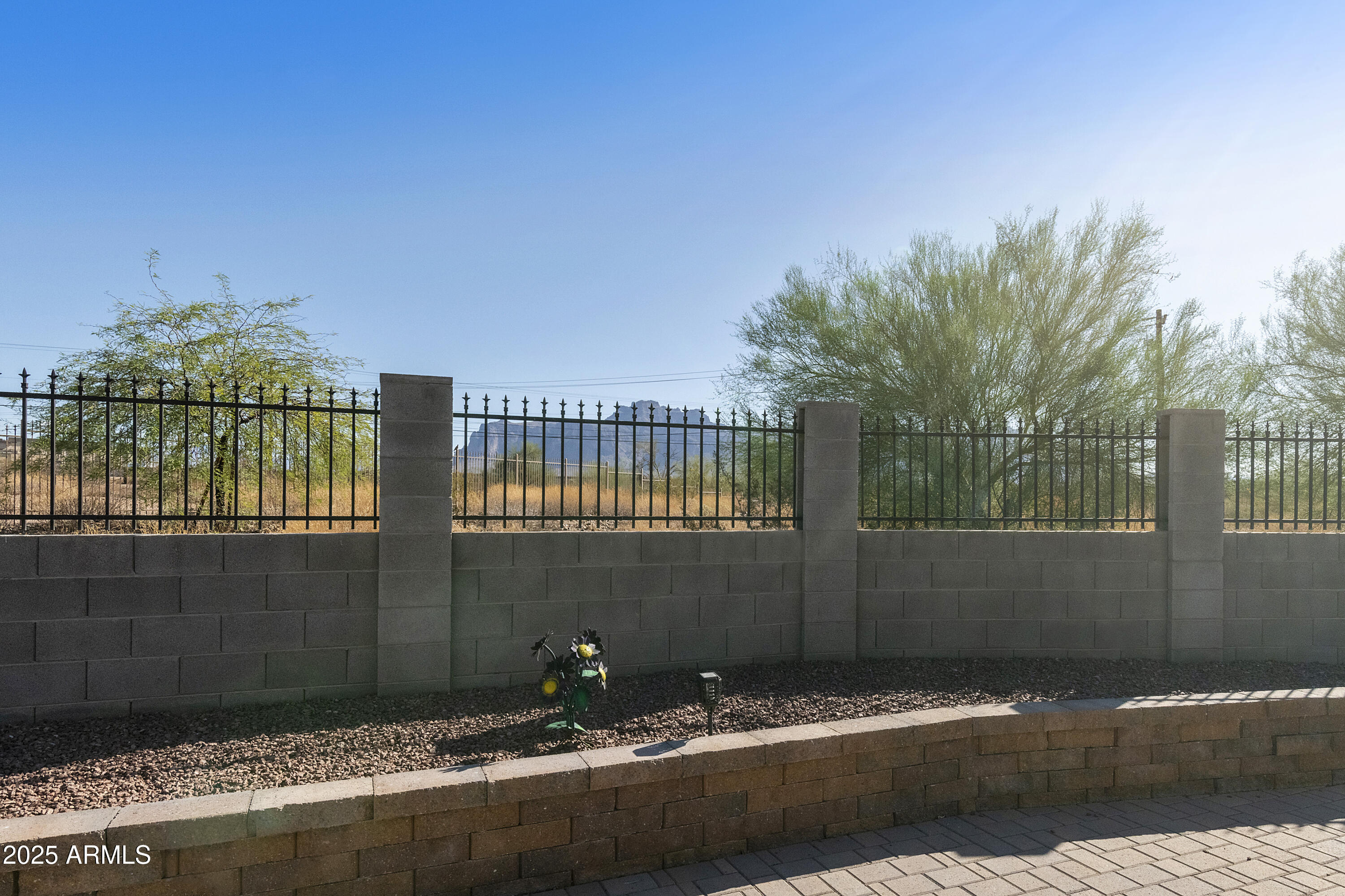 1740 East 16th Avenue Apache Junction, AZ 85119 - Photo 24 of 27 a backyard of a house