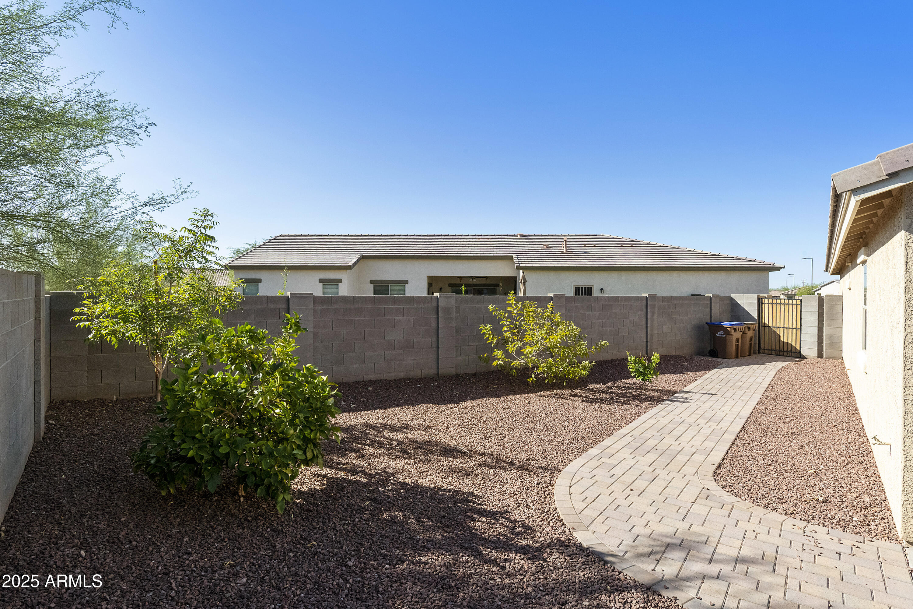1740 East 16th Avenue Apache Junction, AZ 85119 - Photo 26 of 27 a front view of a house with a yard