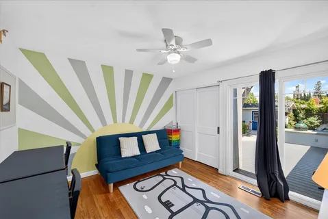 a view of a livingroom with furniture staircase and front door