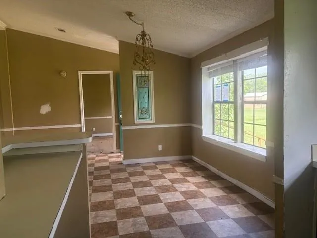 a view of a room with windows