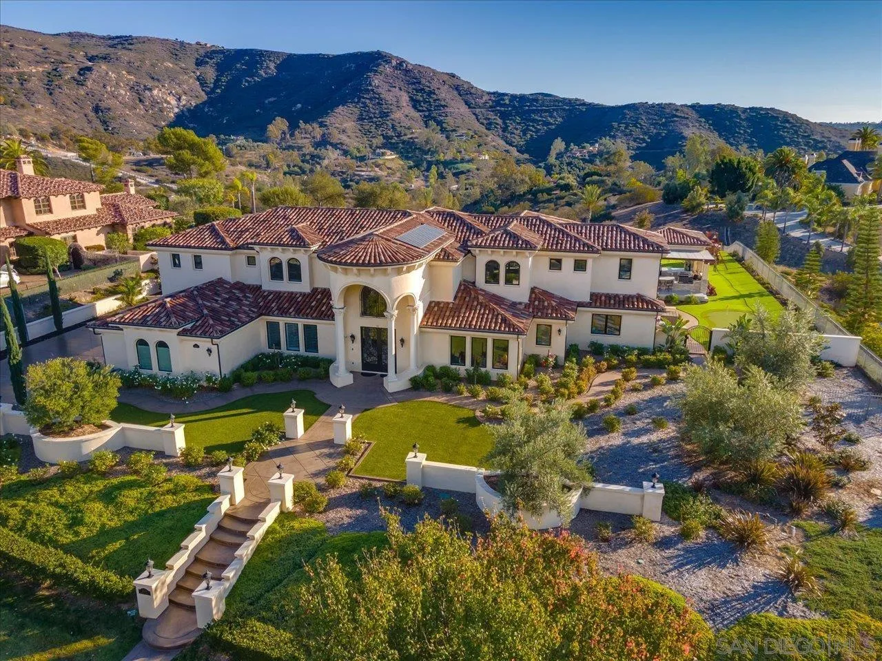14445 Cheyenne Trail Poway, CA 92064 - Photo 49 of 62 an aerial view of a house with a garden and lake view