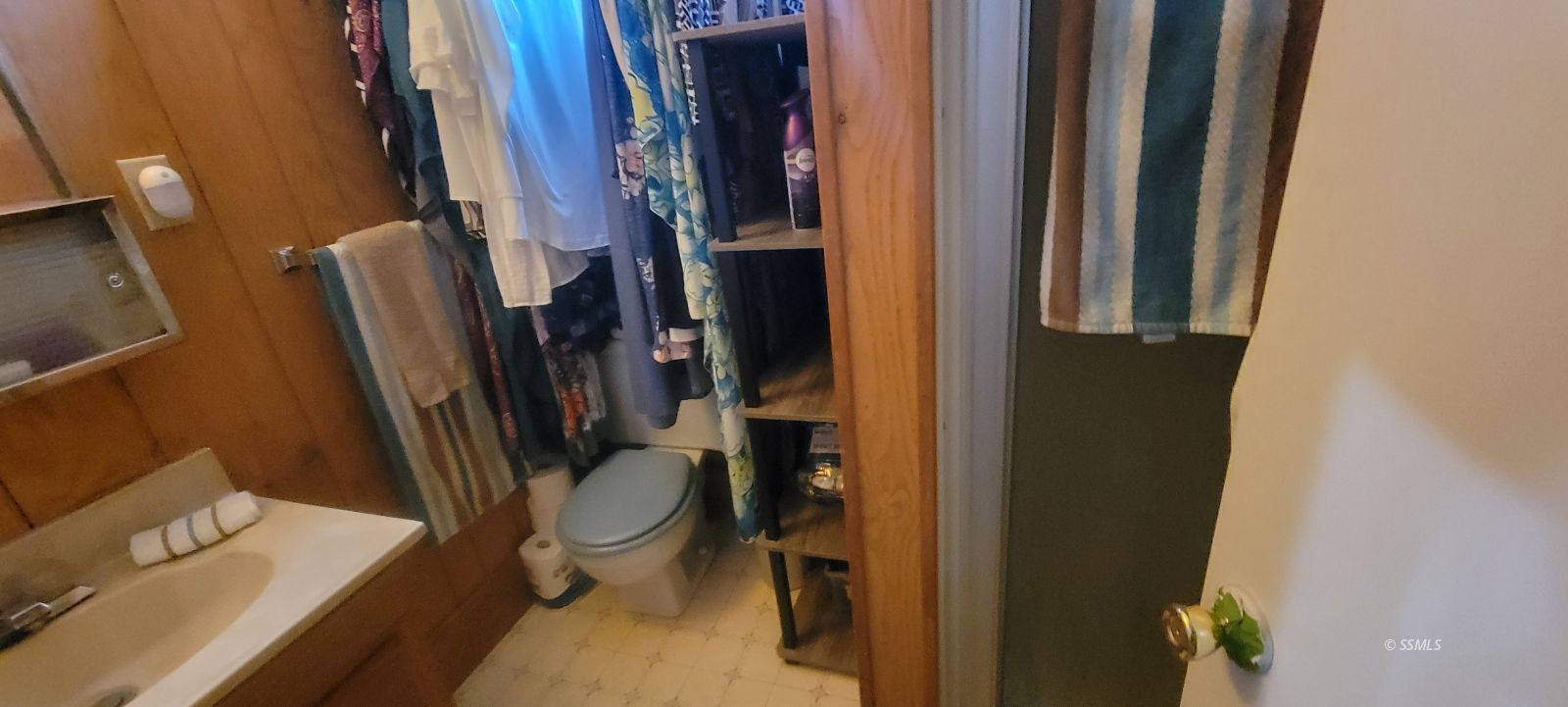 1435 West Perch Avenue Ridgecrest, CA 93555 - Photo 16 of 40 a view of walk in closet with clothes and shoes
