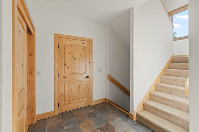 a view of an entryway with staircase