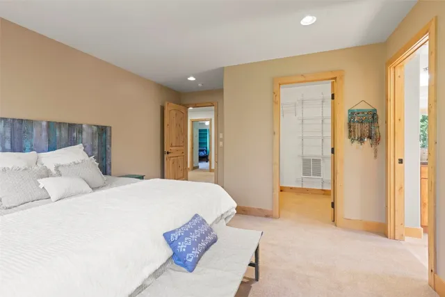 a spacious bathroom with a double vanity sink mirror and double