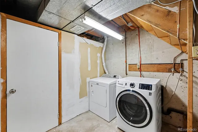 a utility room with dryer and washer
