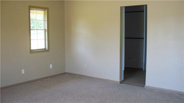 48 Mt Lebanon Road Lawrenceburg, TN 38464 - Photo 6 of 10 an empty room with windows