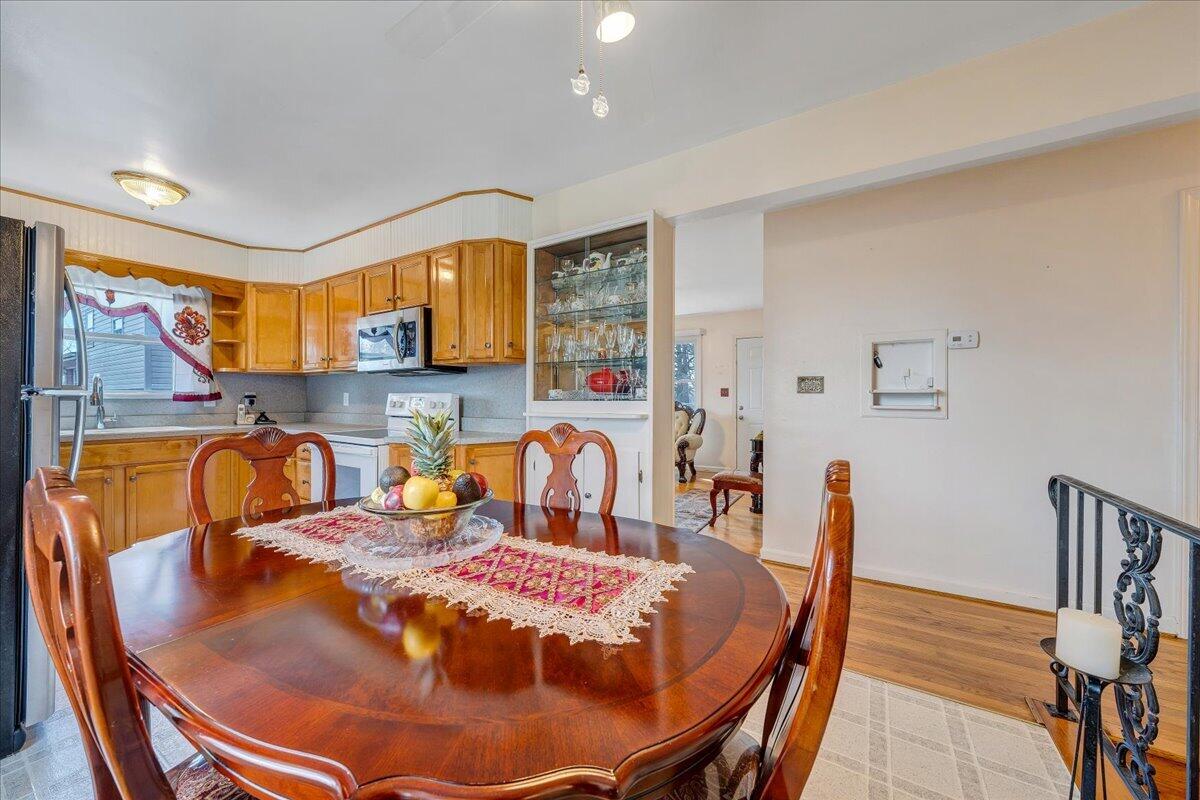 1707 Glendon Road Salem, VA 24153 - Photo 11 of 41 a dining room with furniture and wooden floor