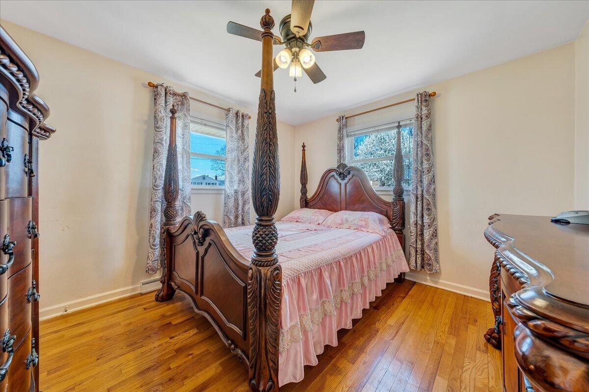 1707 Glendon Road Salem, VA 24153 - Photo 12 of 41 a bed sitting in a bedroom next to a window