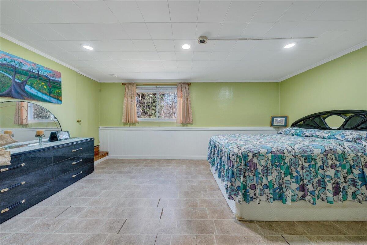 1707 Glendon Road Salem, VA 24153 - Photo 22 of 41 a bedroom with a bed and a dresser