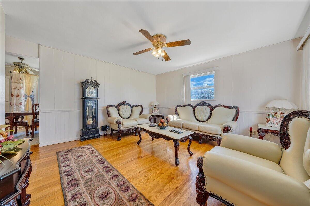 1707 Glendon Road Salem, VA 24153 - Photo 4 of 41 a work room with furniture and wooden floor