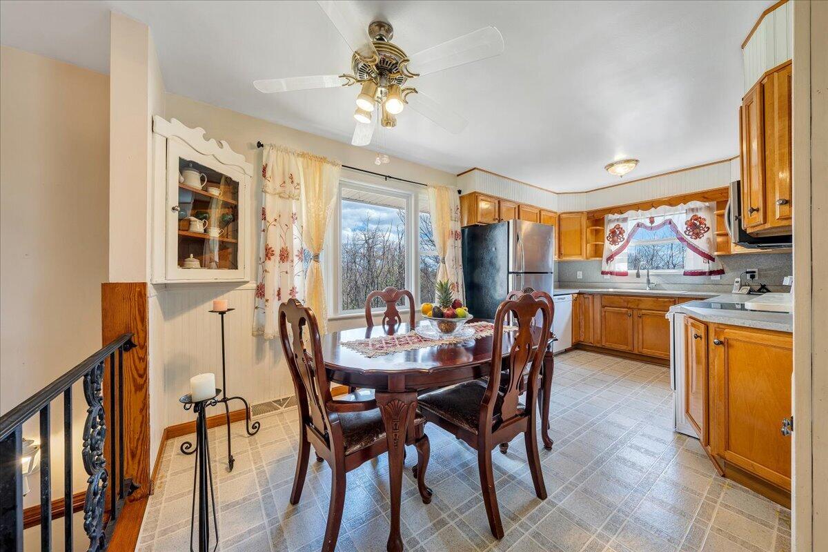 1707 Glendon Road Salem, VA 24153 - Photo 7 of 41 a view of a dining room with furniture and a chandelier