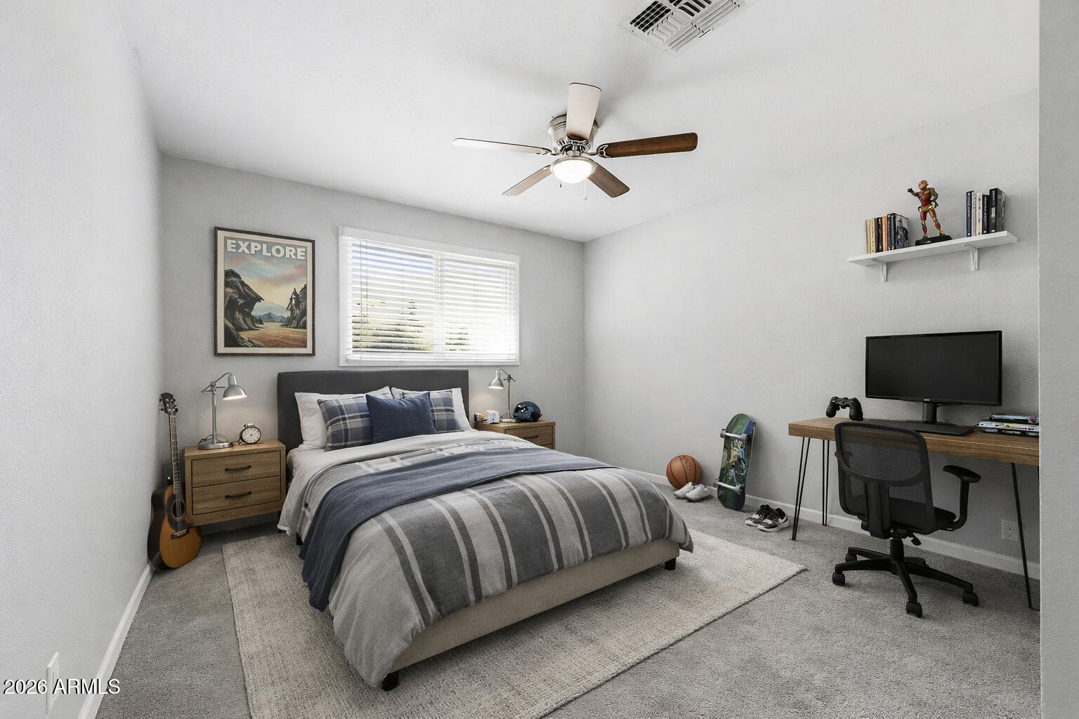 1726 West Royal Palm Road Phoenix, AZ 85021 - Photo 10 of 20 a bedroom with a bed and a desk