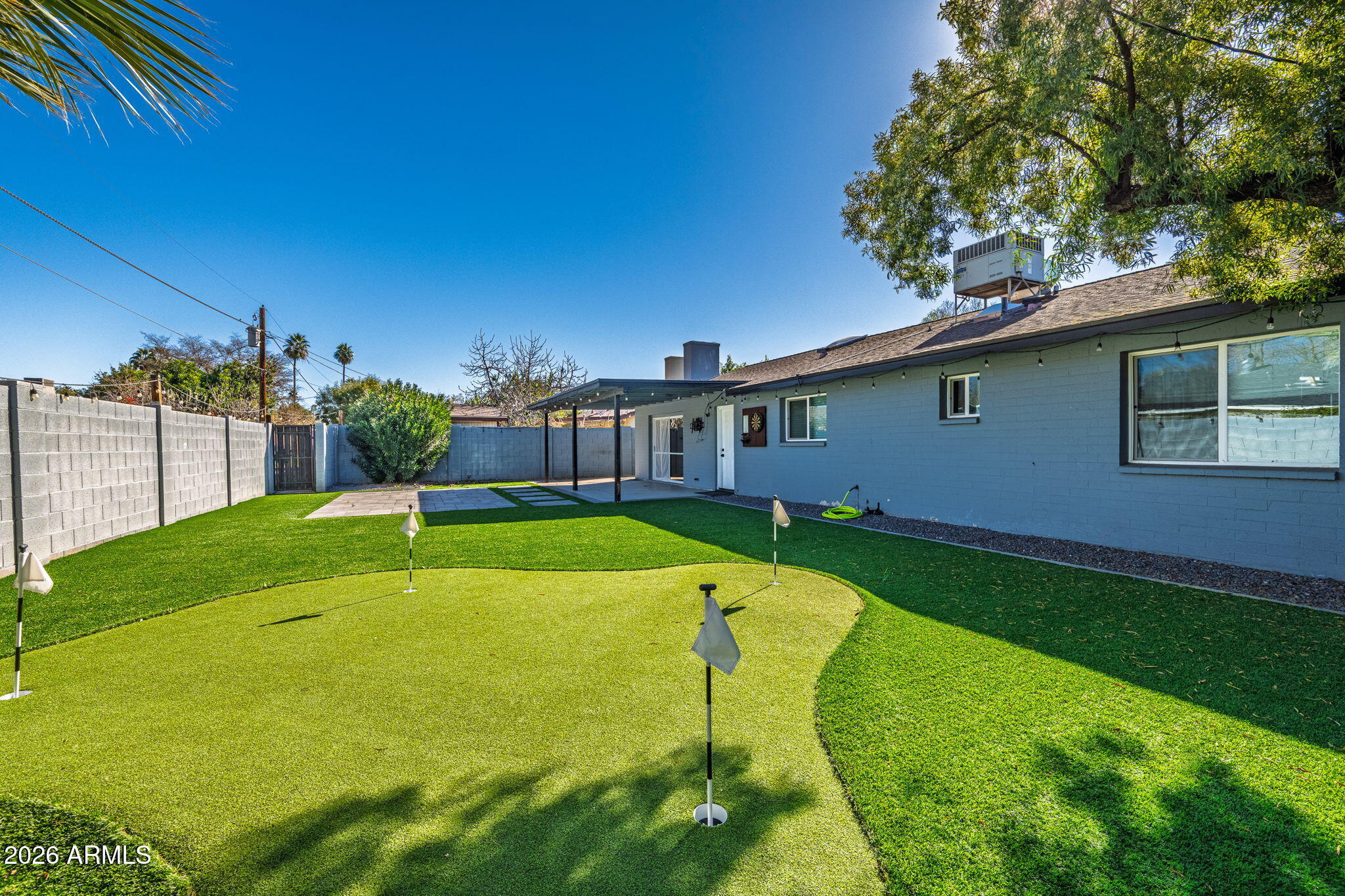 1726 West Royal Palm Road Phoenix, AZ 85021 - Photo 14 of 20 a view of swimming pool with a garden