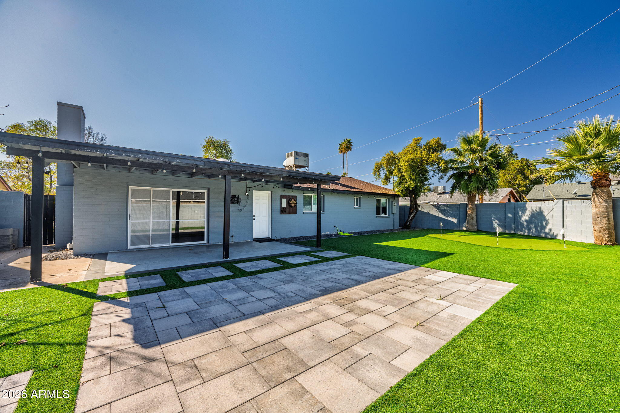 1726 West Royal Palm Road Phoenix, AZ 85021 - Photo 15 of 20 a front view of a house with garden