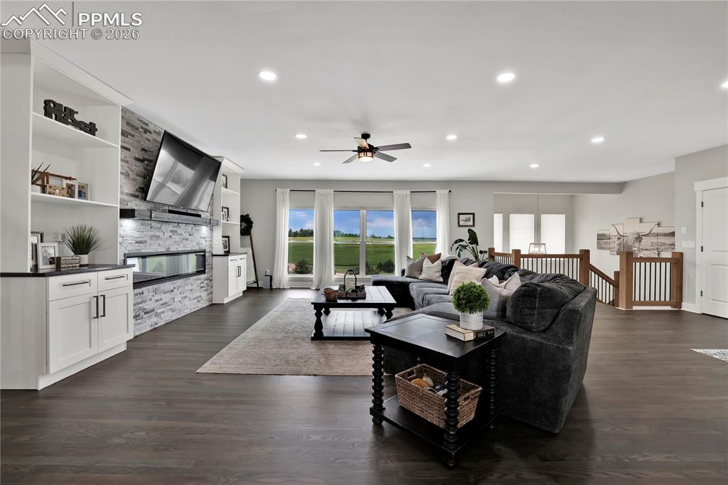 18135 Spur Ranch Road Peyton, CO 80831 - Photo 14 of 50 Large Windows, Real Hardwood, Modern finishes that feel cozy, what more could you need?