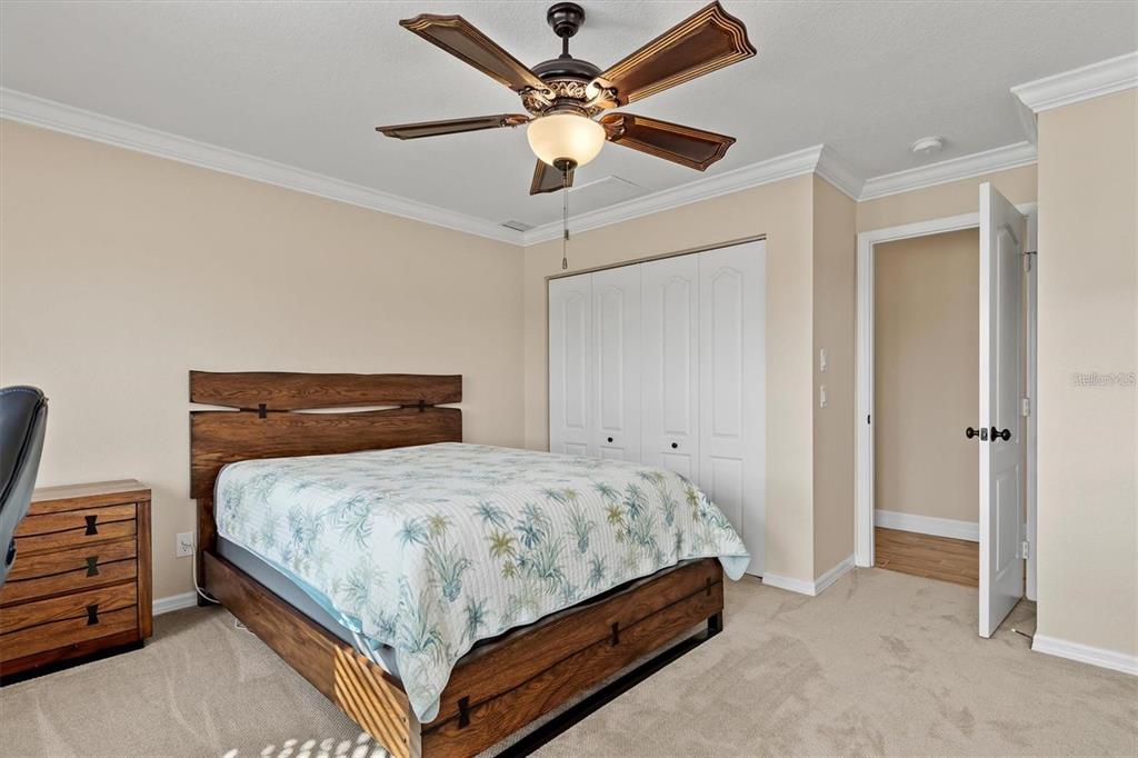 1701 Casey Key Drive Punta Gorda, FL 33950 - Photo 24 of 58 a bedroom with a bed and window