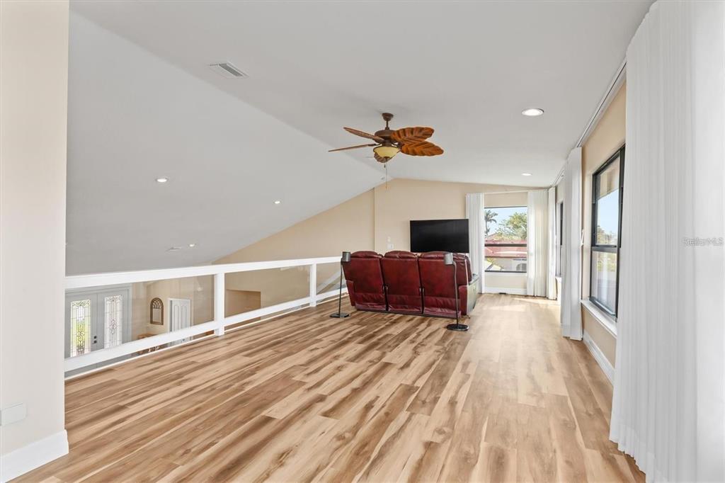 1701 Casey Key Drive Punta Gorda, FL 33950 - Photo 37 of 58 a living room with furniture fireplace and window