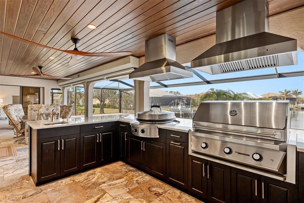 1701 Casey Key Drive Punta Gorda, FL 33950 - Photo 46 of 58 a kitchen with a stove and a sink