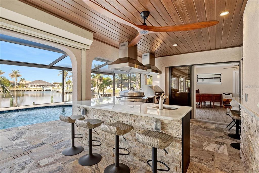 1701 Casey Key Drive Punta Gorda, FL 33950 - Photo 47 of 58 a dining room with furniture and wooden floor