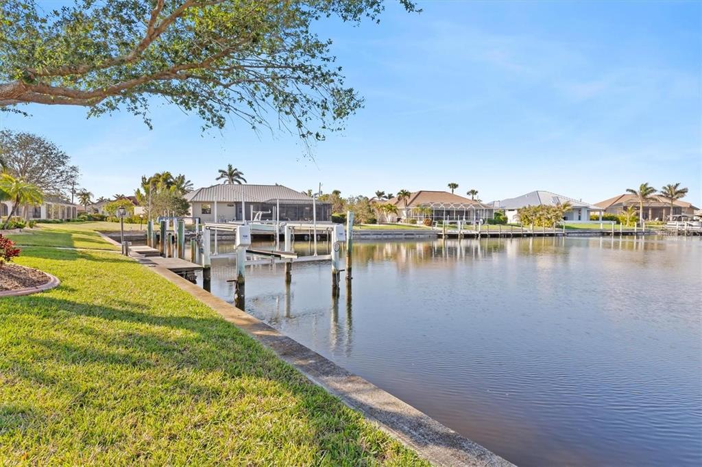 1701 Casey Key Drive Punta Gorda, FL 33950 - Photo 53 of 58 a view of a lake with houses