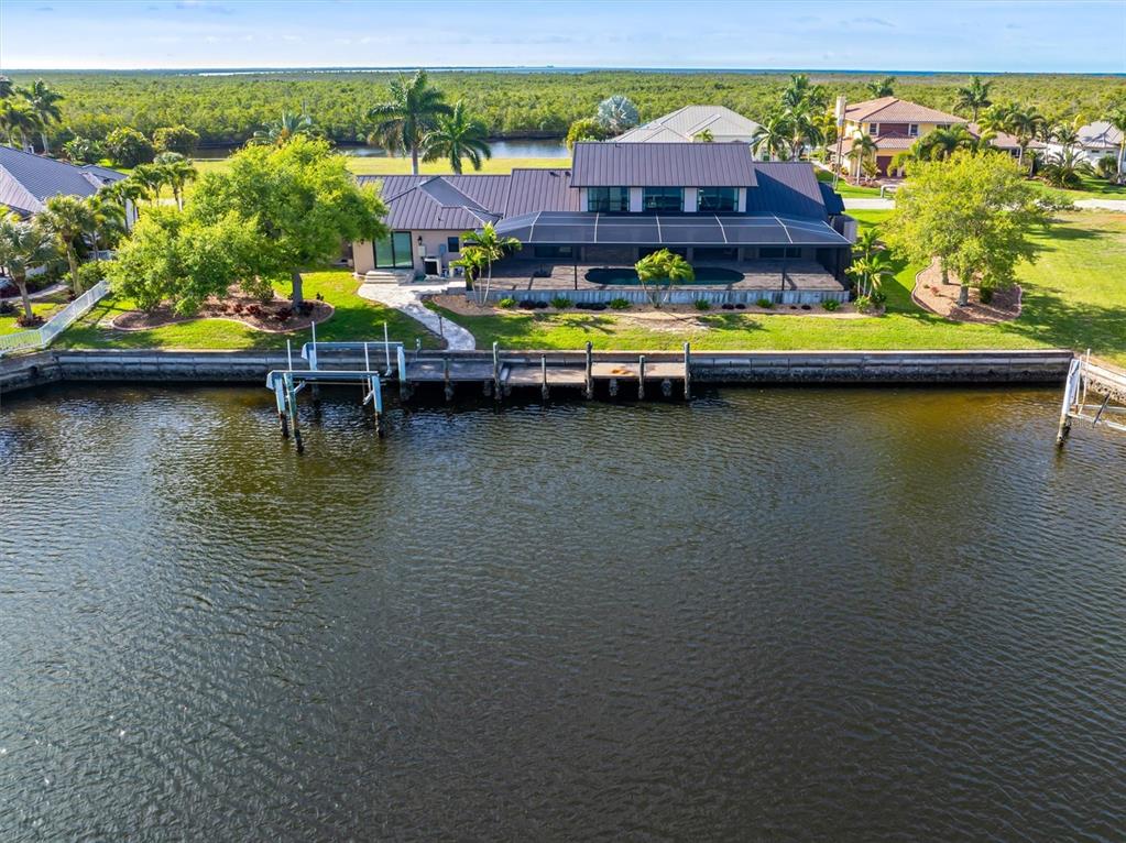 1701 Casey Key Drive Punta Gorda, FL 33950 - Photo 54 of 58 an aerial view of residential houses with outdoor space