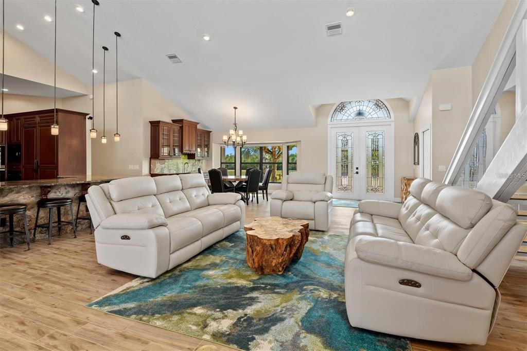 1701 Casey Key Drive Punta Gorda, FL 33950 - Photo 7 of 58 a living room with furniture and a large window