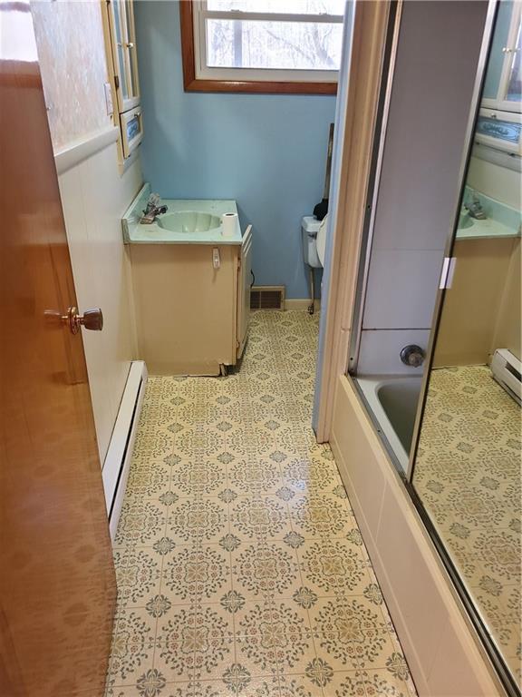 122 Logan Road New Castle, PA 16102 - Photo 4 of 17 a view of bathroom with bathtub and shower