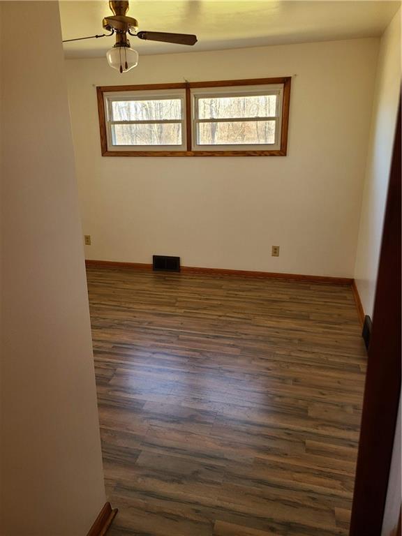 122 Logan Road New Castle, PA 16102 - Photo 6 of 17 a view of an empty room with a window