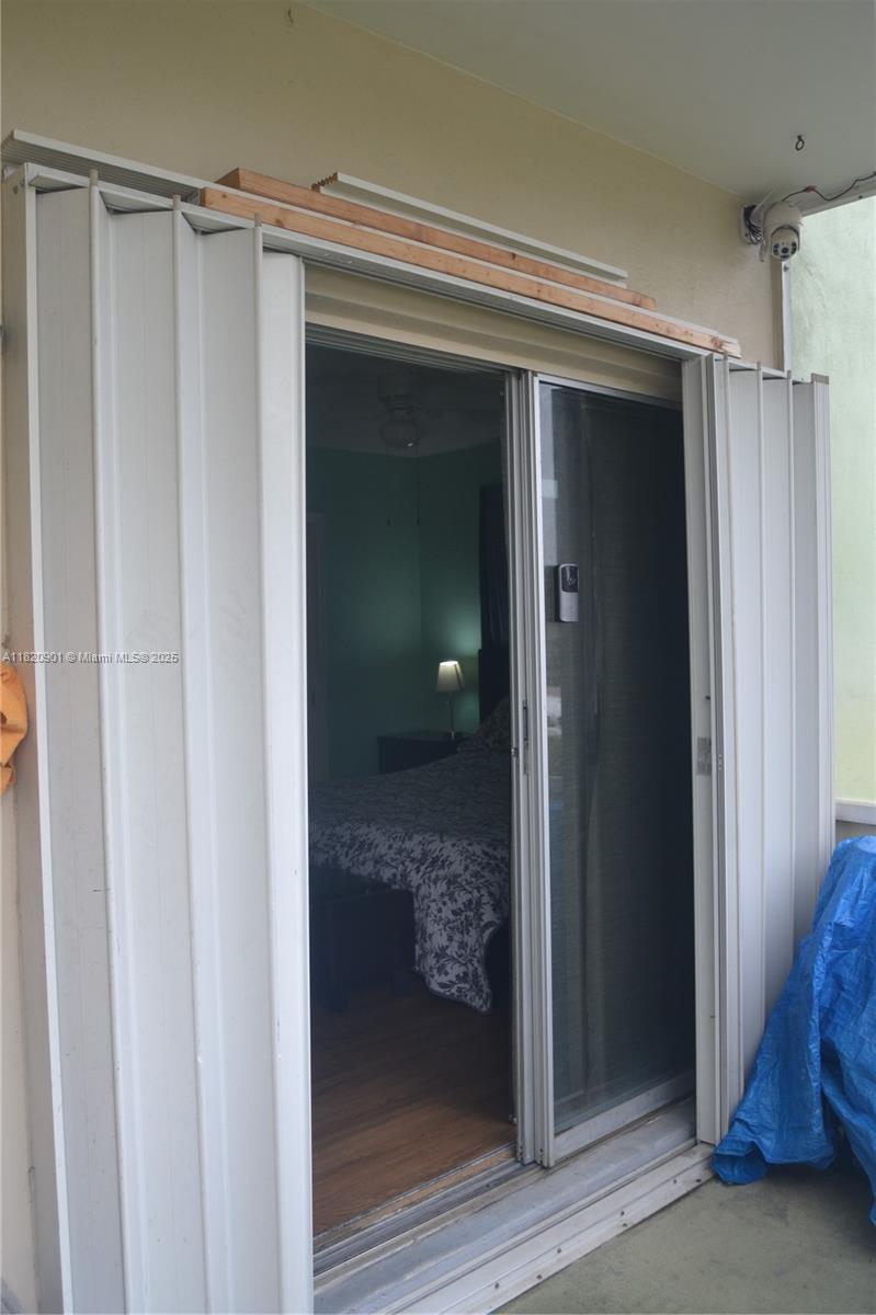 56 Norwich C, Unit 56 West Palm Beach, FL 33417 - Photo 12 of 23 a view of elevator and door