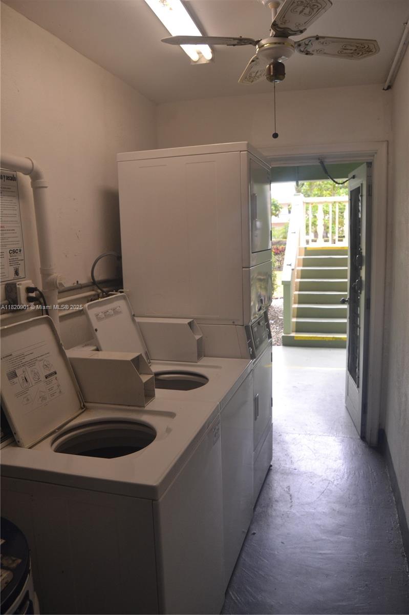 56 Norwich C, Unit 56 West Palm Beach, FL 33417 - Photo 17 of 23 a bathroom with a sink a vanity and a mirror