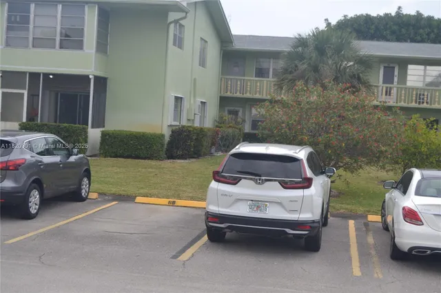 a car parked in front of a house