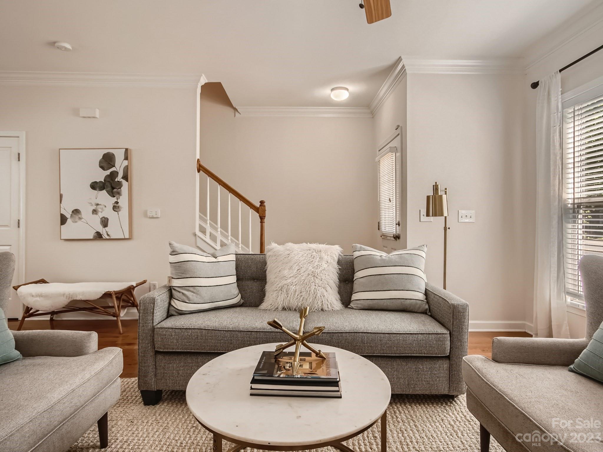 4130 Walker Road Charlotte, NC 28211 - Photo 1 of 28 a living room with furniture and a fireplace